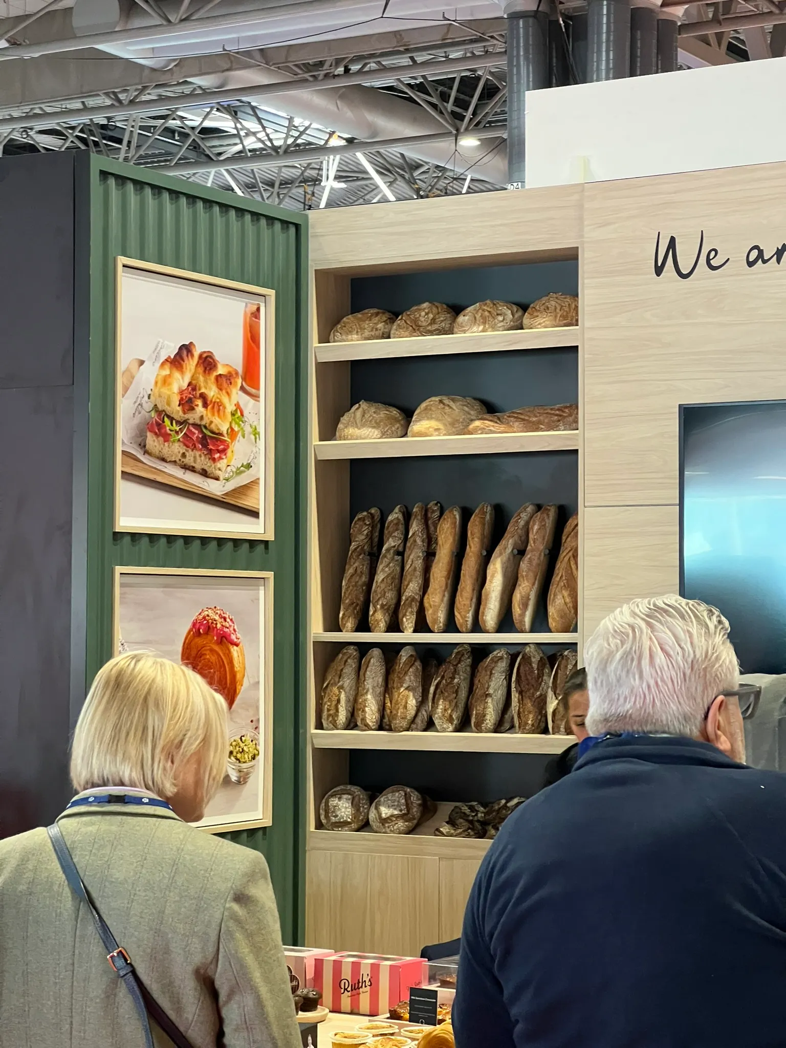 Ash cabinetry for baguette display wall for Europastry