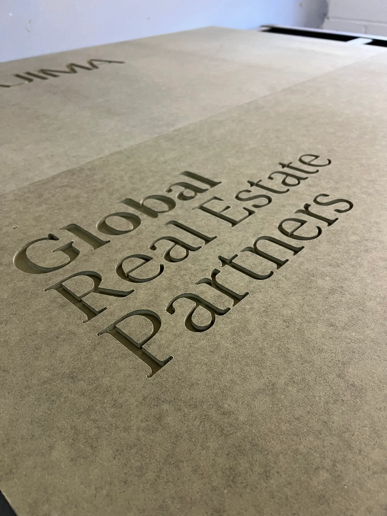 Engraved signage for Global Real Estate Partners